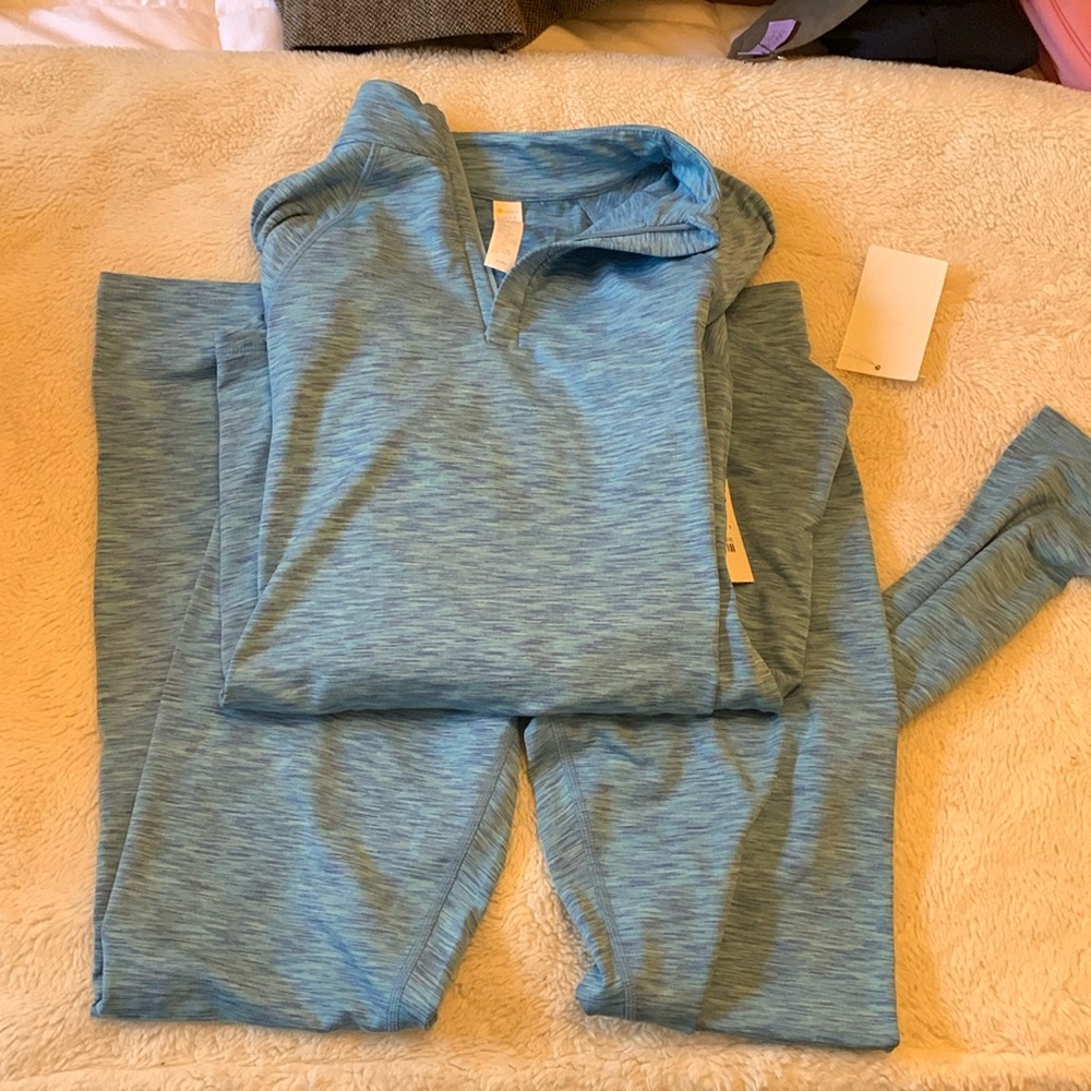 Blue leggings and half zip work out set. Zella girls size 10-12.